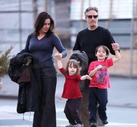 Jon Stewart and his wife with their kids